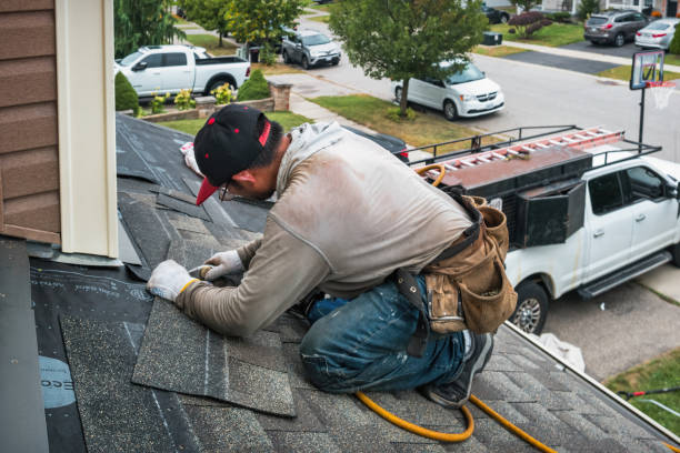 Professional Roofing technician working in Bow, WA